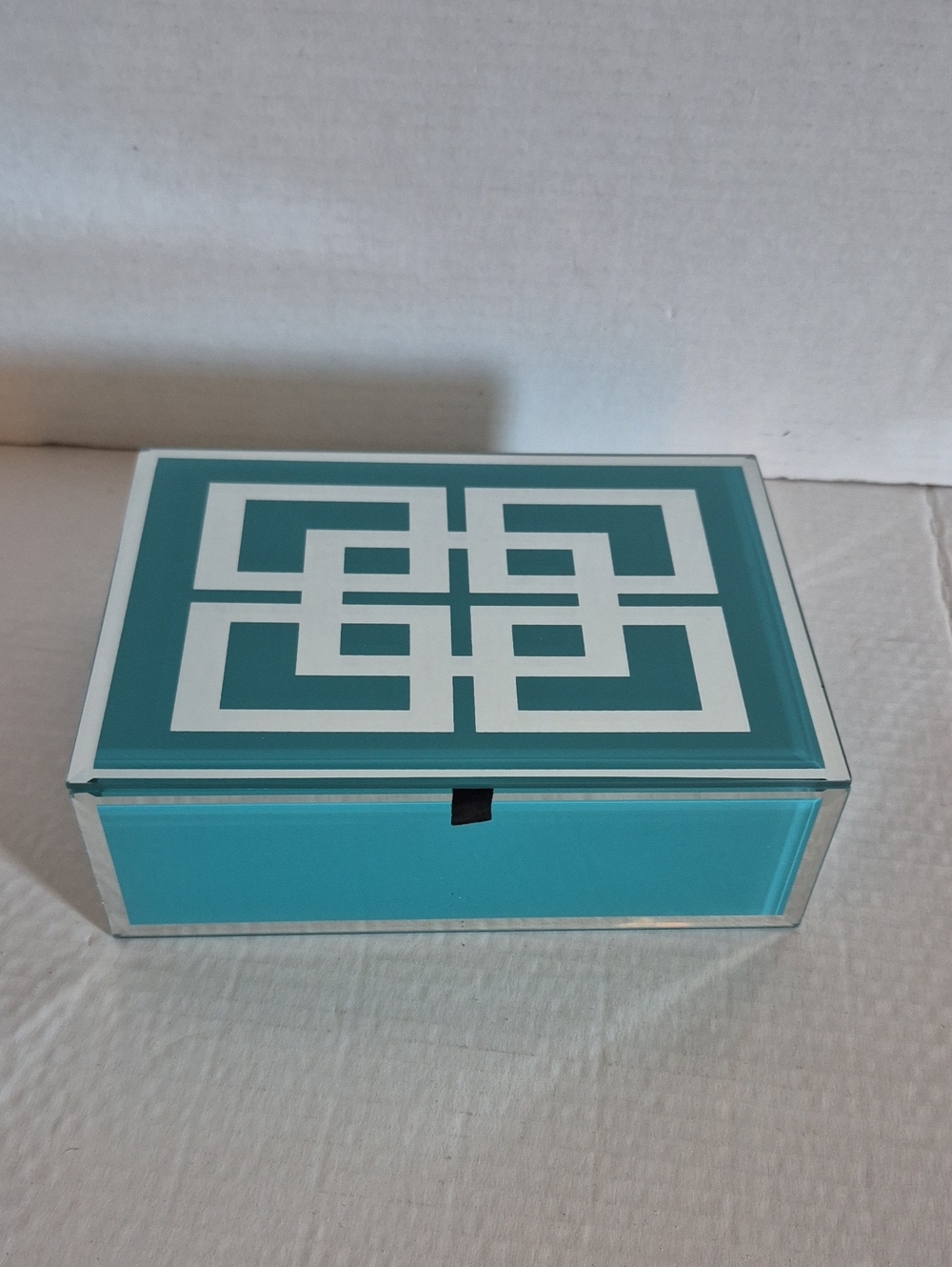 Glass Decorative Storage Box in Teal with Silver Geometric Design Velvet Inside.